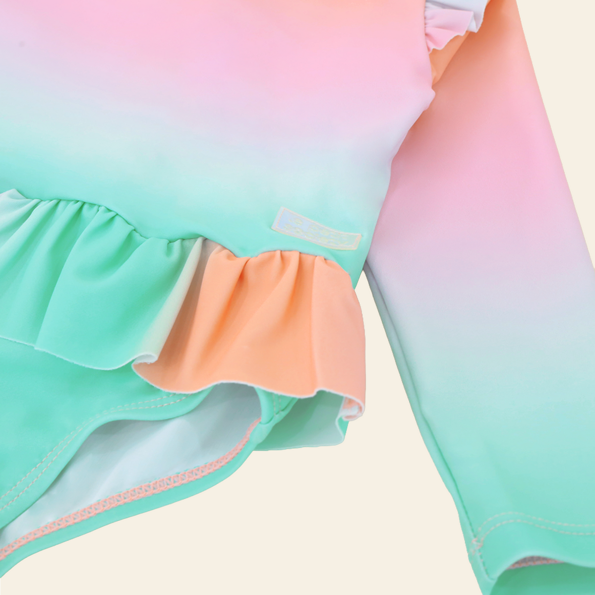 Baby Ruffle Swimsuit in Pastel Gradient by Le Petit Society — image 4