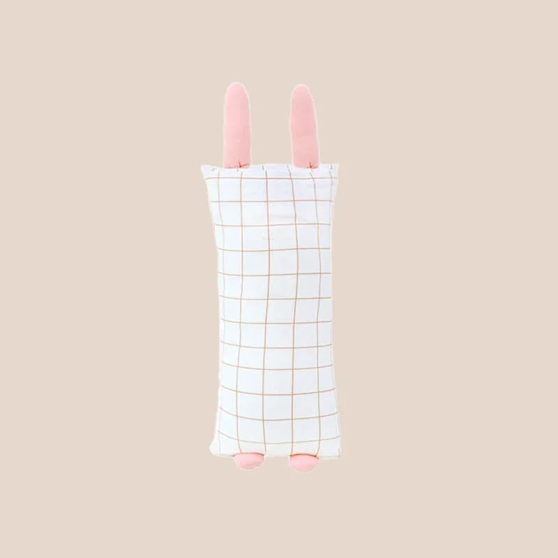 The back of a mini bamboo pillow in a pink rabbit design for kids by Le Petit Society.