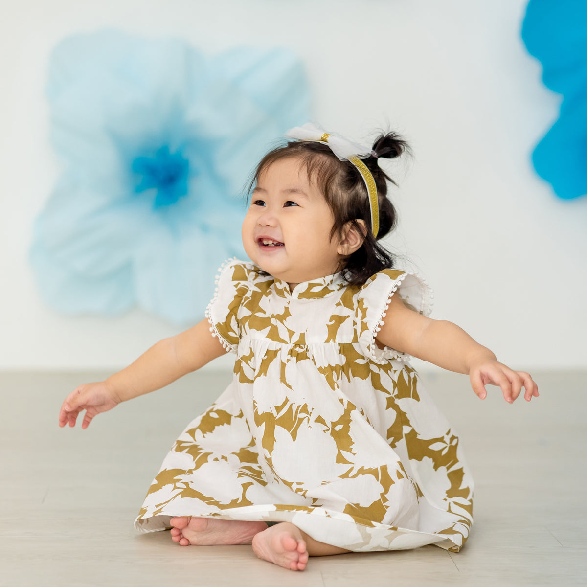 Garden Series - Baby Girl Flutter Dress in Ochre Floral by Le Petit Society — image 10