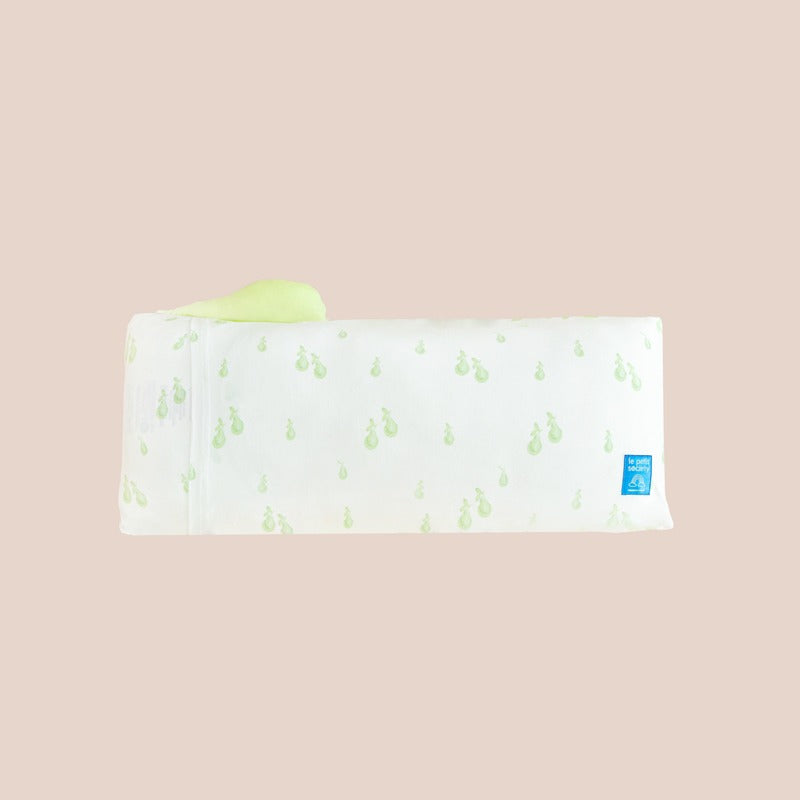 The back of a kids' pillow in medium from Le Petit Society, featuring a print of green pears.