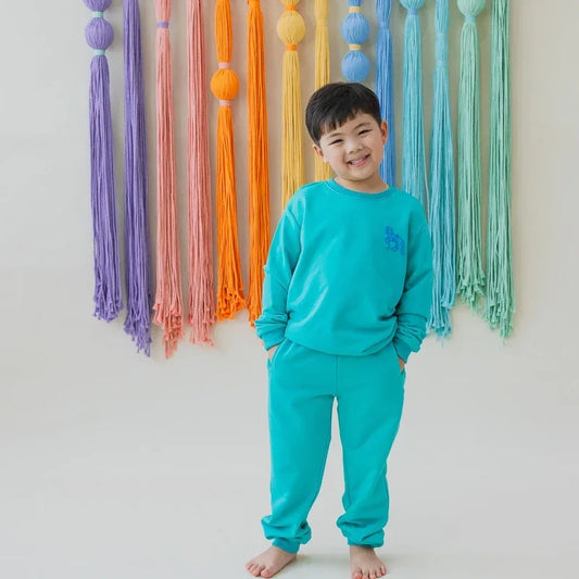 Zodiac Series - Kids Jogger Pants in Green by Le Petit Society — image 2