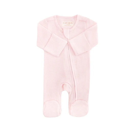 An organic baby zip sleepsuit in pink by Le Petit Society.
