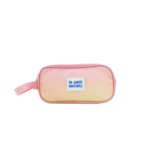Le Petit Society's double zip pencil case in a pink and yellow gradient.
