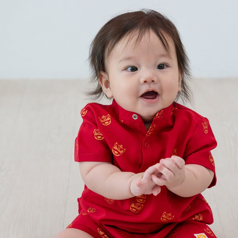 Red lion dance print baby romper by Le Petit Society