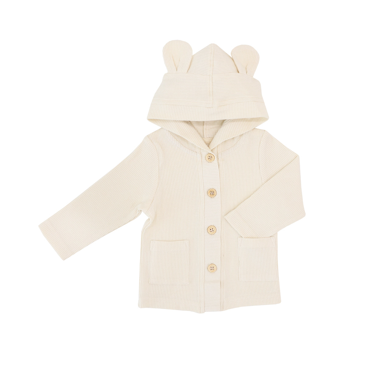 A baby boy cardigan in cream waffle jersey from Le Petit Society. It comes with buttons down the front, double front pockets and a hood with bear ears.