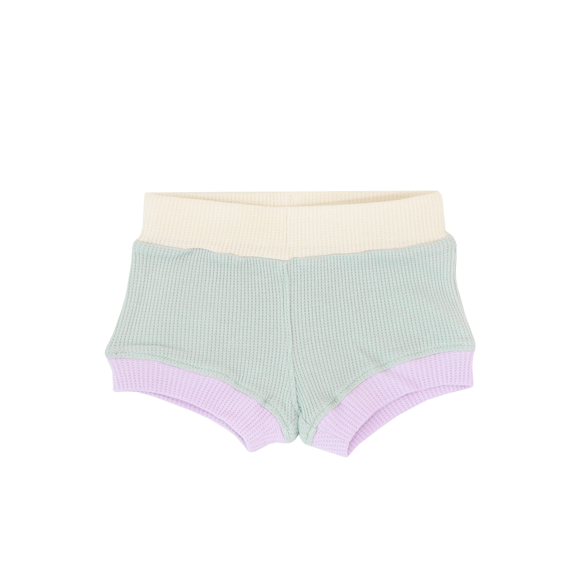 A pair of baby boxers made in a waffle jersey fabric. It has a pastel colour block colour scheme;. consisting of sage green, purple and yellow.