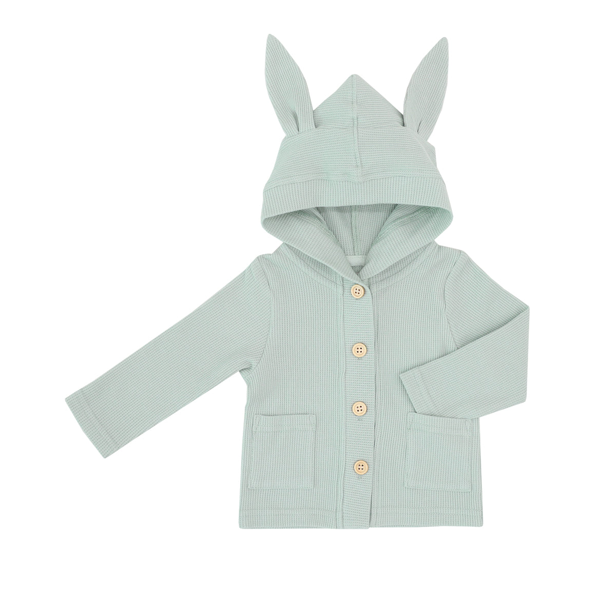 A baby cardigan from Le Petit Society made from waffle jersey with bunny ears on the hood. It is sage green in colour and also has two front pockets.
