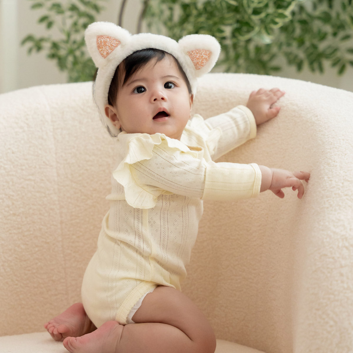 Baby Girl Long Sleeve Ruffle Romper in Cream Pointelle Cotton by Le Petit Society — image 7