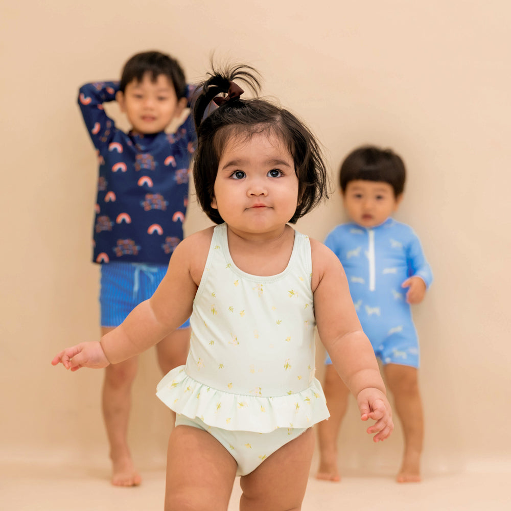 Baby Ruffle Swimsuit in Mint Floral by Le Petit Society — image 8