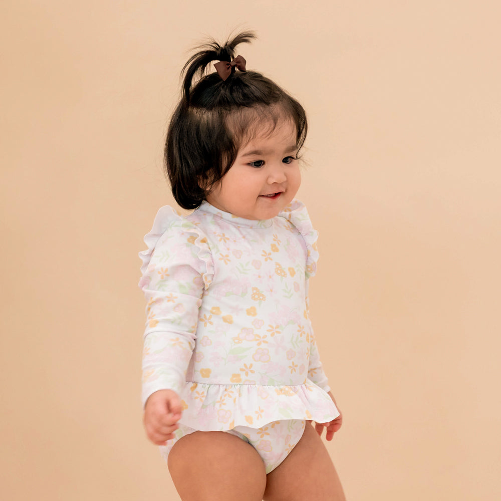 Baby Ruffle Swimsuit in Pastel Floral by Le Petit Society — image 2