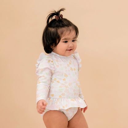 Baby Ruffle Swimsuit in Pastel Floral by Le Petit Society — image 2