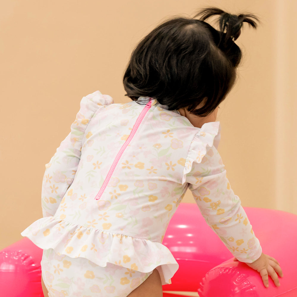 Baby Ruffle Swimsuit in Pastel Floral by Le Petit Society — image 3