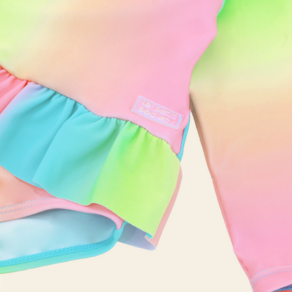 Baby Ruffle Swimsuit in Rainbow Gradient by Le Petit Society — image 4