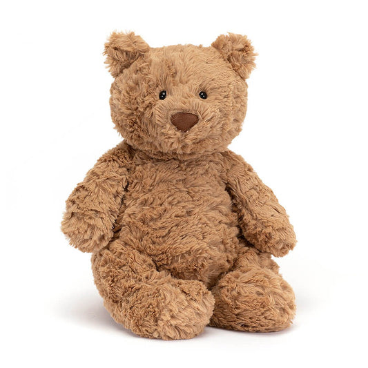 A front view of a soft, light brown teddy bear with a round body, short limbs, and a cute face featuring black button eyes and a brown nose, sitting upright against a plain white background