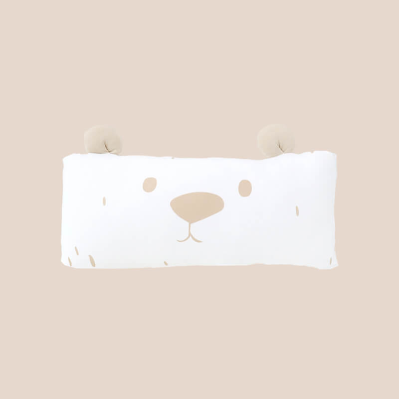 A bamboo pillow in a brown bear design for kids by Le Petit Society.