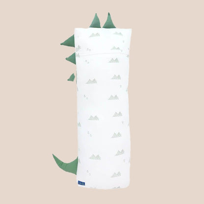 The back of a kids' bamboo pillow with a green dinosaur design in large by Le Petit Society.
