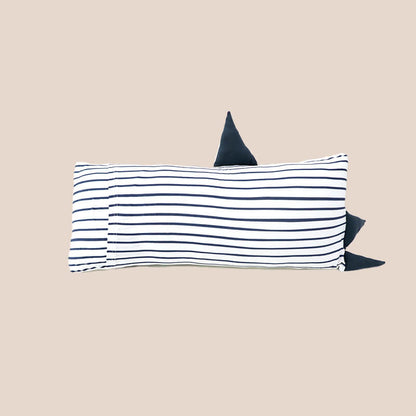 The back of a kids' bamboo pillow with a navy shark design in medium by Le Petit Society.