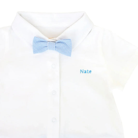 A baby boy bow tie romper with blue stripes and a name embroidery personalisation on the left chest.