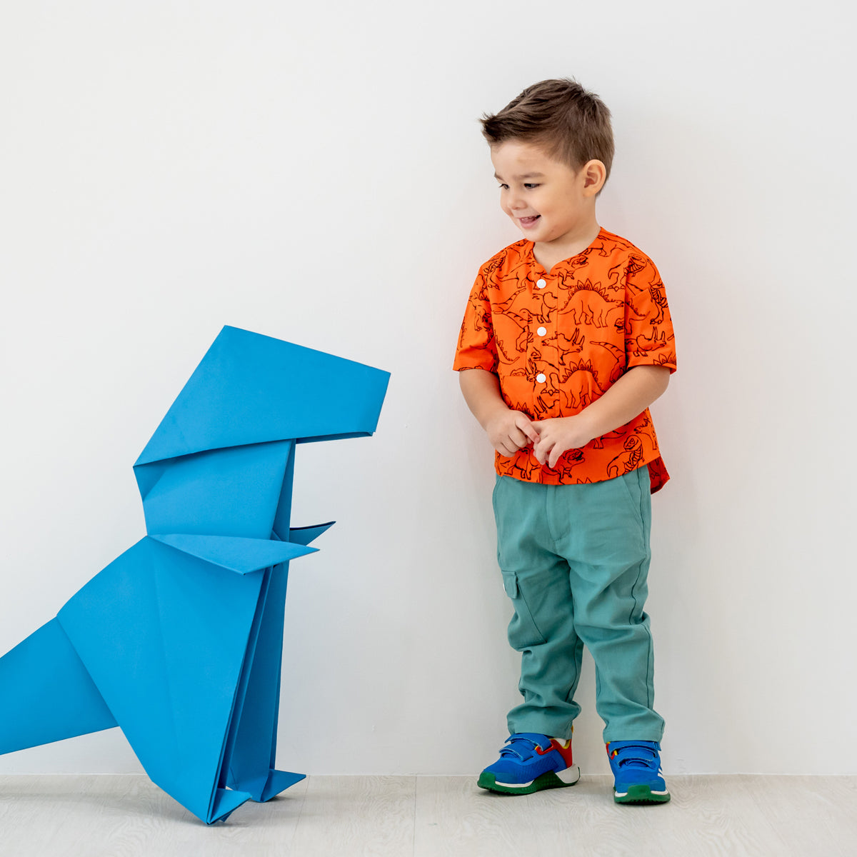 Made for Play - Boys Wide-Pocket Shirt in Dino Sketch Print in Orange by Le Petit Society — image 16