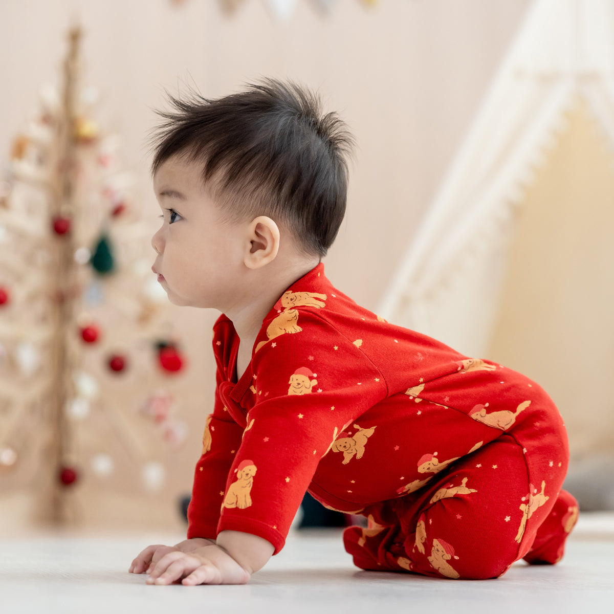 Baby Organic Sleepsuit in Christmas Puppy Print by Le Petit Society — image 2
