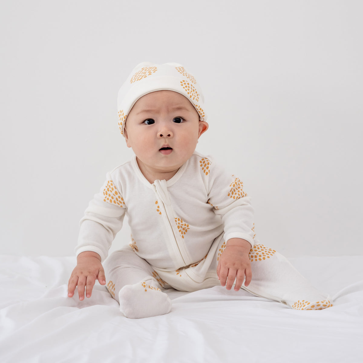 Baby Organic Zip Sleepsuit in Dandelion Print by Le Petit Society — image 11