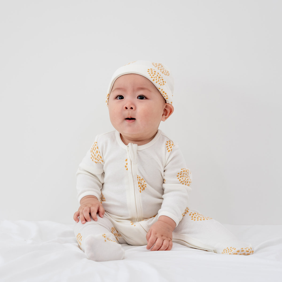 Baby Organic Zip Sleepsuit in Dandelion Print by Le Petit Society — image 3