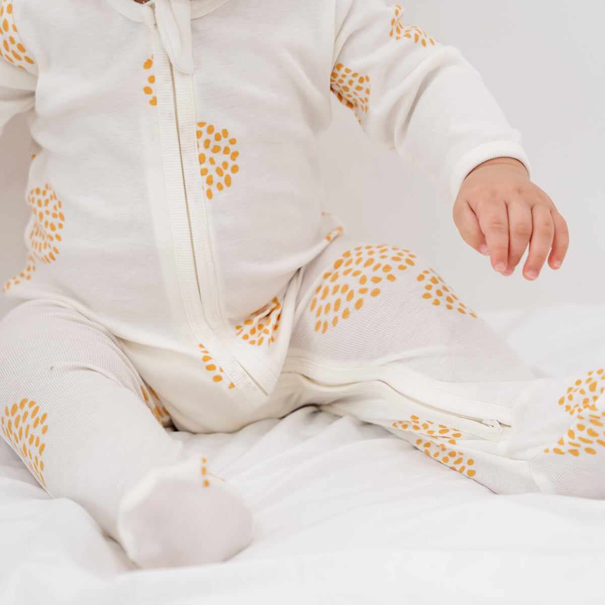 Baby Organic Zip Sleepsuit in Dandelion Print by Le Petit Society — image 8