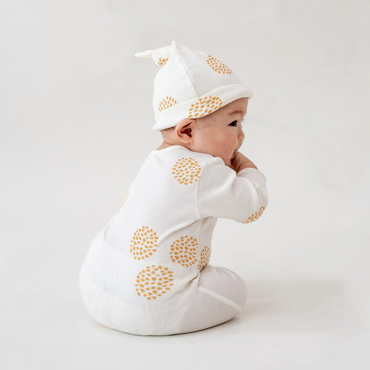 Baby Organic Zip Sleepsuit in Dandelion Print by Le Petit Society