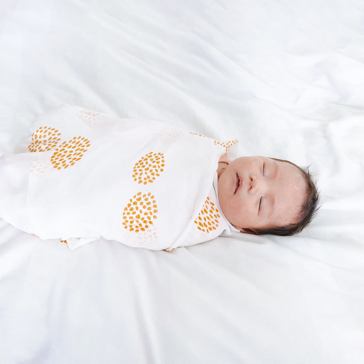 Baby Organic Swaddle in Dandelion Print by Le Petit Society — image 3