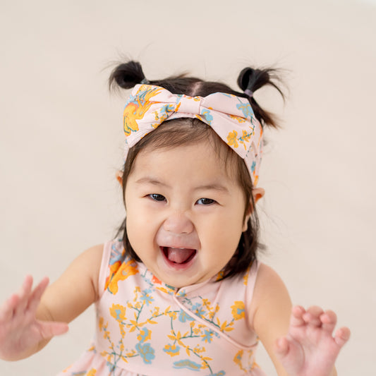 Dragon Series - Baby Bow Headband in Pink by Le Petit Society