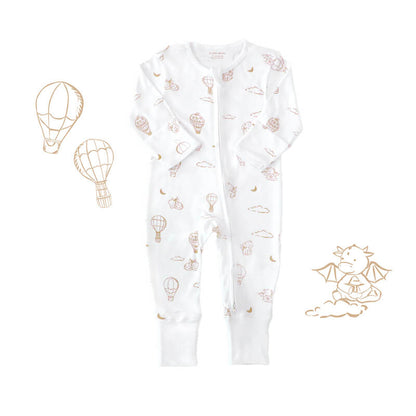 Le Petit Society's organic baby zip sleepsuit in white with a print of dragons, clouds, moons and hot air balloons. It comes foldable mittens and footies.