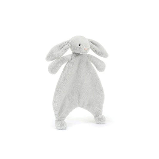A front view of a grey plush bunny comforter with long floppy ears, stitched facial features, and a flat blanket-style body with lightly padded arms and feet, positioned standing against a white background.