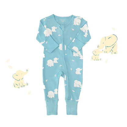 An organic baby zip sleepsuit from Le Petit Society. It is teal blue in colour with an elephant print and foldable mittens and footies.