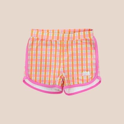 Girls Swim Shorts in Pink Gingham Print by Le Petit Society
