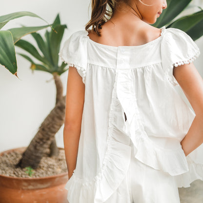 Resort Series - Girls Flutter Sleeves Baby Doll Top in White by Le Petit Society