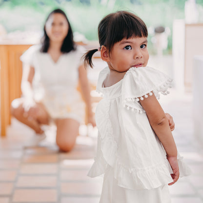 Resort Series - Girls Flutter Sleeves Baby Doll Top in White by Le Petit Society — image 6