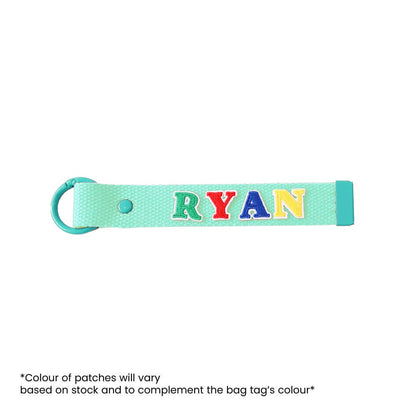 Le Petit Society's customisable bag tag with name patches.