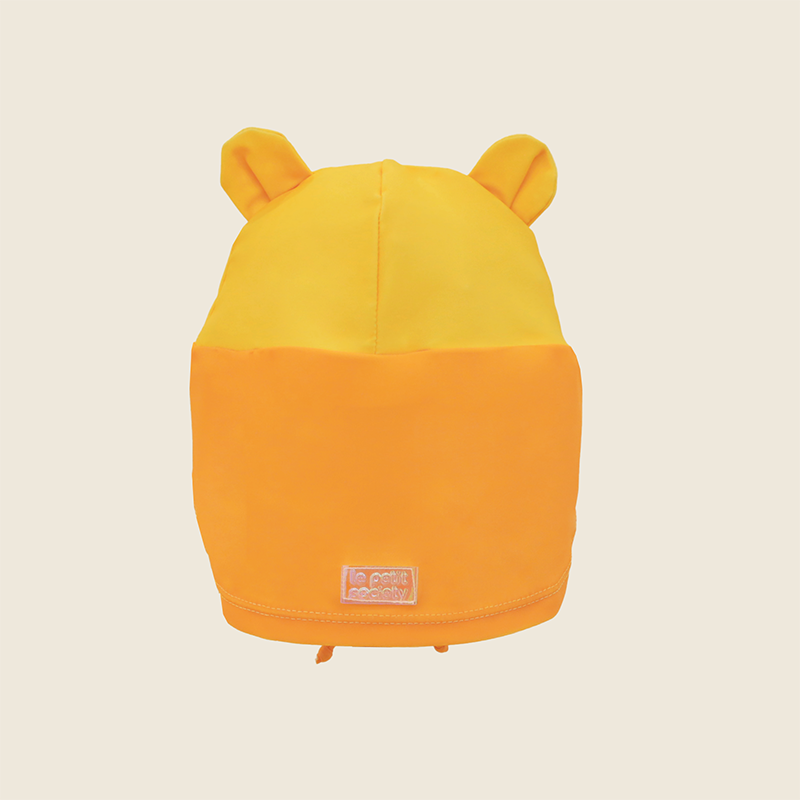 sunhat-back.pngBaby Lion Sunhat back view showing full orange neck flap coverage and Le Petit Society logo patch
