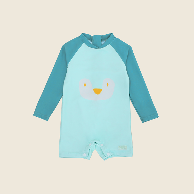 Baby Girl in Le Petit Society Blue Penguin Swimsuit Front Product Shot