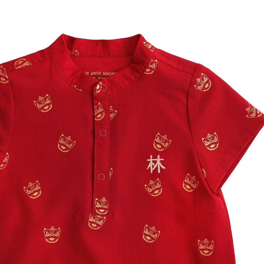 Red lion dance print baby romper by Le Petit Society