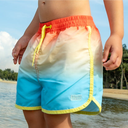 Swim Shorts in Sunset Gradient by Le Petit Society — image 3