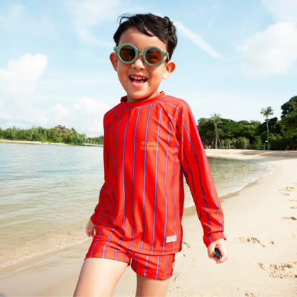 Swim Trunks in Red Stripes by Le Petit Society — image 2
