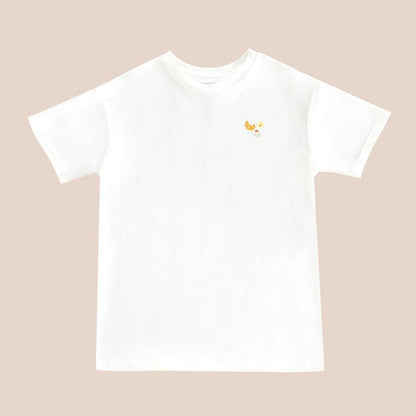 An adult tee in white, featuring a small print of breakfast food, from Le Petit Society.