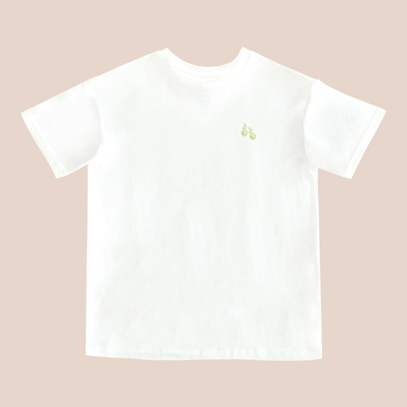 A white adult tee featuring a small print of green pears, from Le Petit Society.