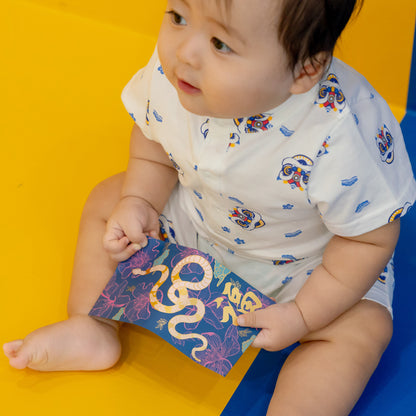 Lion Dance Series - Baby Boy Jersey Romper in White by Le Petit Society — image 2