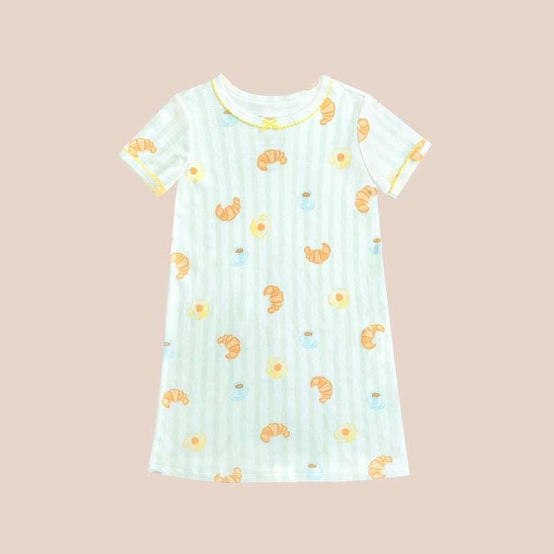 Le Petit Society's kids' dress made from bamboo fabric, featuring a print of breakfast food and green stripes. 
