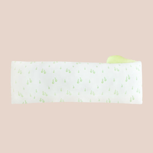 A kids' bamboo pillow with a pear print in size large by Le Petit Society.