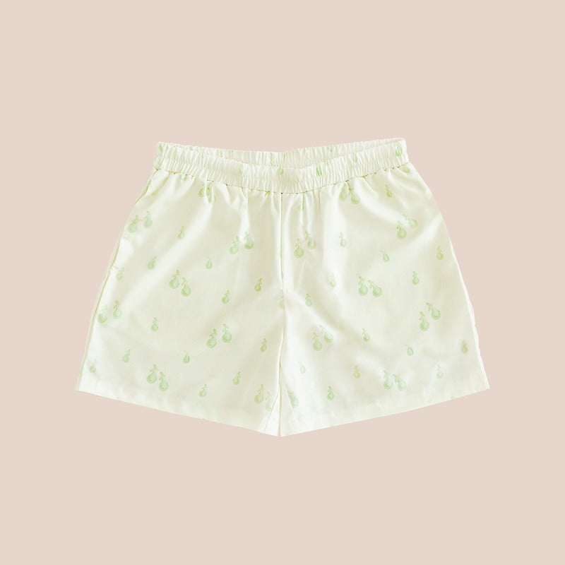 A pair of men's lounge shorts with a print of green pears, from Le Petit Society.