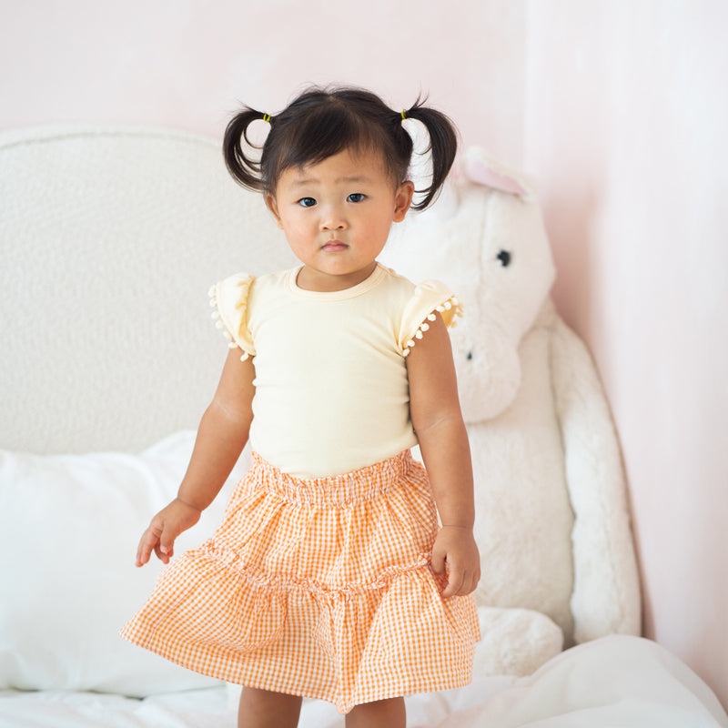 Resort Series - Girls Tiered Skirt in Orange Gingham by Le Petit Society — image 2