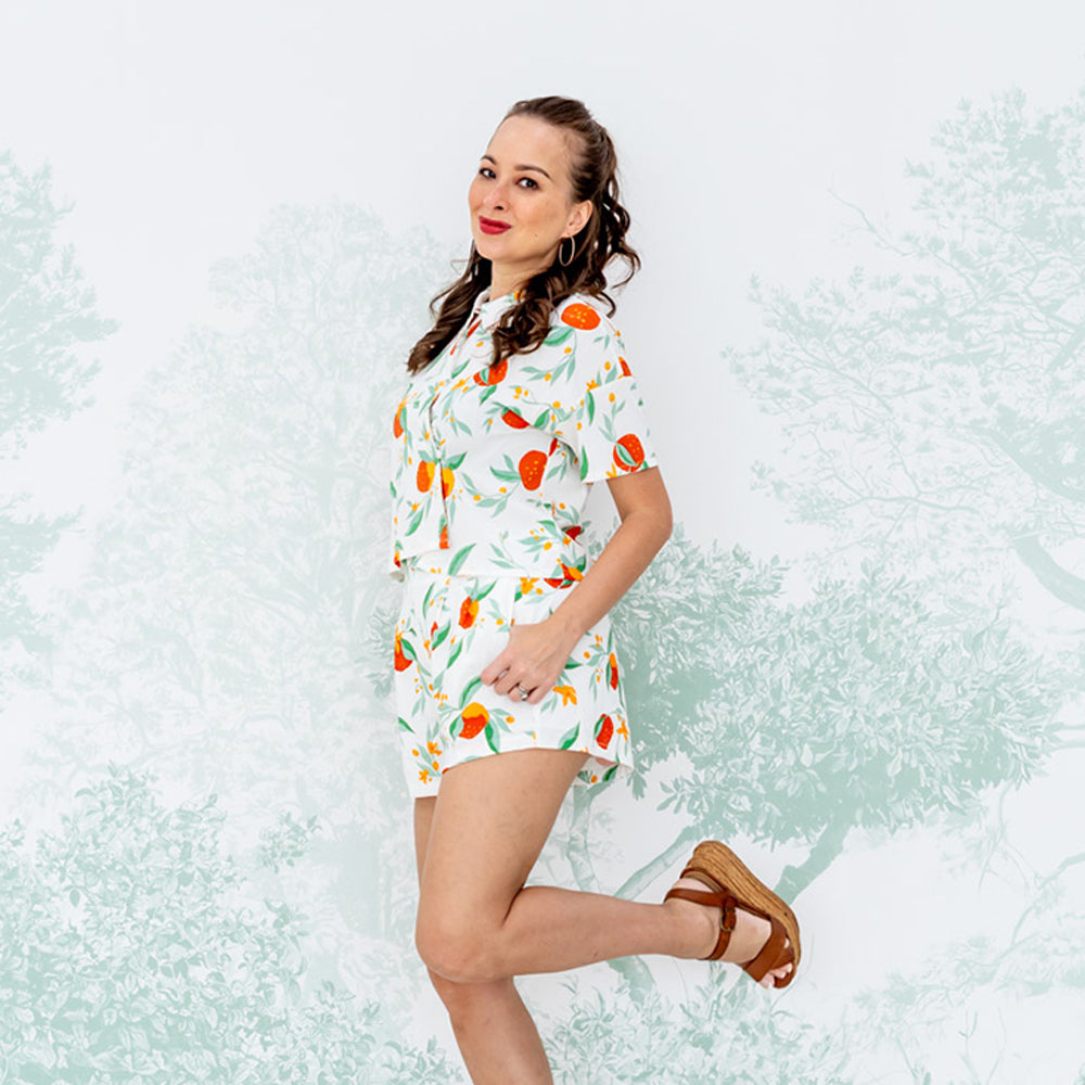 Mandarin Orange Series - Ladies High Waist Shorts in White Floral Orange Print by Le Petit Society